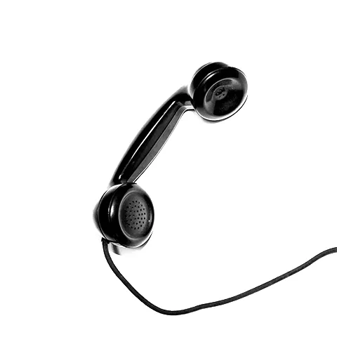 An older black phone with white background